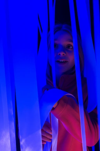 Interior of the illuminated UV maze in the center of Krakow